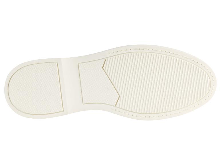 Weiße Gummisohle eines Schuhs.