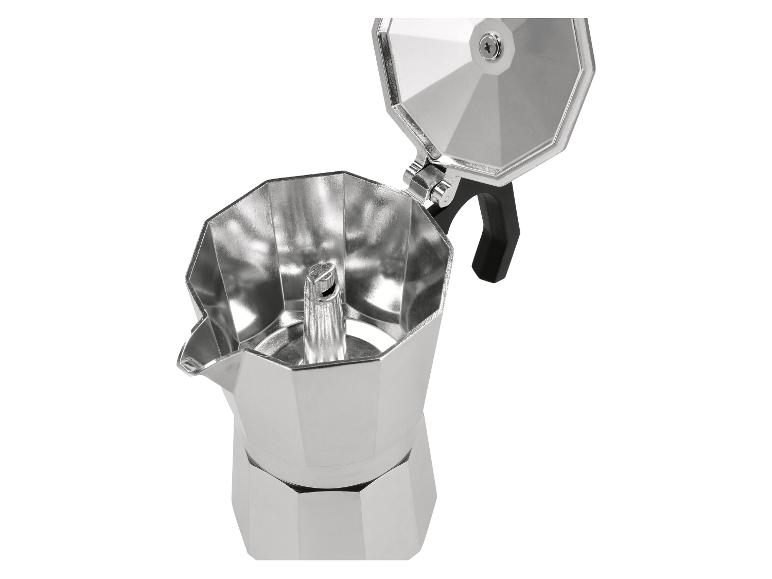 Offene silberne Espressokanne mit schwarzem Griff