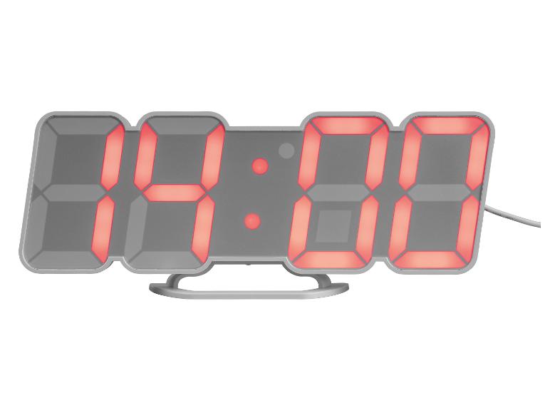 Digitaluhr mit rotem LED-Display, das die Uhrzeit 04:00 anzeigt.