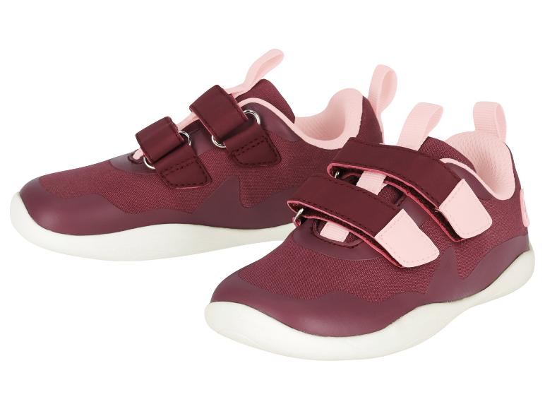 Bordeauxfarbene Kindersneaker mit Klettverschlüssen und rosa Details.