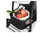 Obst und Gemüse in einer Tasche unter einem Kinderwagen