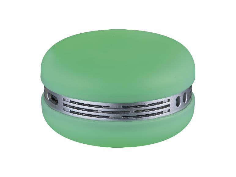 Grüner Macaron-förmiger tragbarer Lautsprecher mit silbernem Gitter