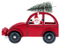 Rotes Spielzeugauto mit Weihnachtsmann und Weihnachtsbaum auf dem Dach