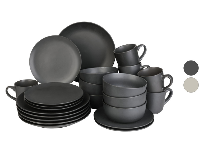 Schwarze Schalen, Teller und Tassen.
