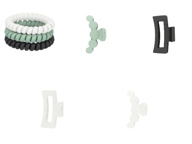 Set aus weißen, mintgrünen und schwarzen Spiralhaargummis und Haarklammern.