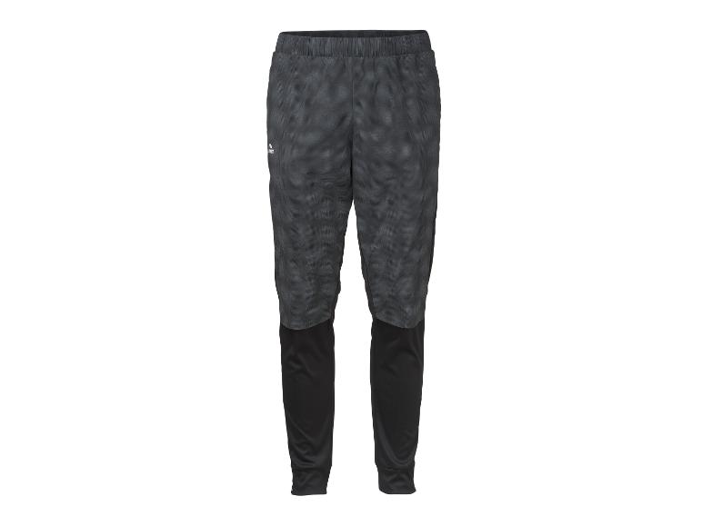 Schwarz-graue Sporthose mit Muster, elastischem Bund und schmal zulaufenden Beinen.