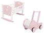 Rosa und weißes Puppenbett und Puppenwagen