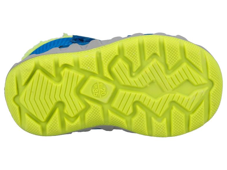 Unterseite eines blau-gelben Kinderschuhs mit rutschfester Sohle.