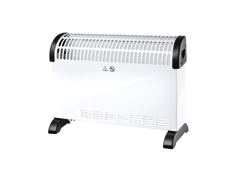 Weißer Elektroheizer mit oberem Gitter und schwarzen Füßen.