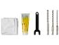 Ein Set Elektrowerkzeugzubehör, bestehend aus einem Tuch, einer Tube Fett, einem Schraubenschlüssel und drei Bohrern.