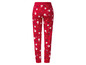 Rote Weihnachts-Pyjamahose mit Weihnachtsmann- und Weihnachtsbaum-Motiv.