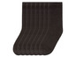 Sieben Paar schwarze Socken.