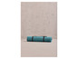 Eine blaue Yogamatte der Marke 