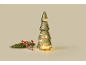 Dekorativer Weihnachtsbaum aus Glas mit LED-Lichtern und einem Tannenzweig daneben.