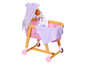 Eine rosa Baby Born Wiege mit Rädern und Mobile.