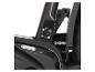 Detail eines schwarzen E-Bikes mit sichtbarem Ladeanschluss und Kette.
