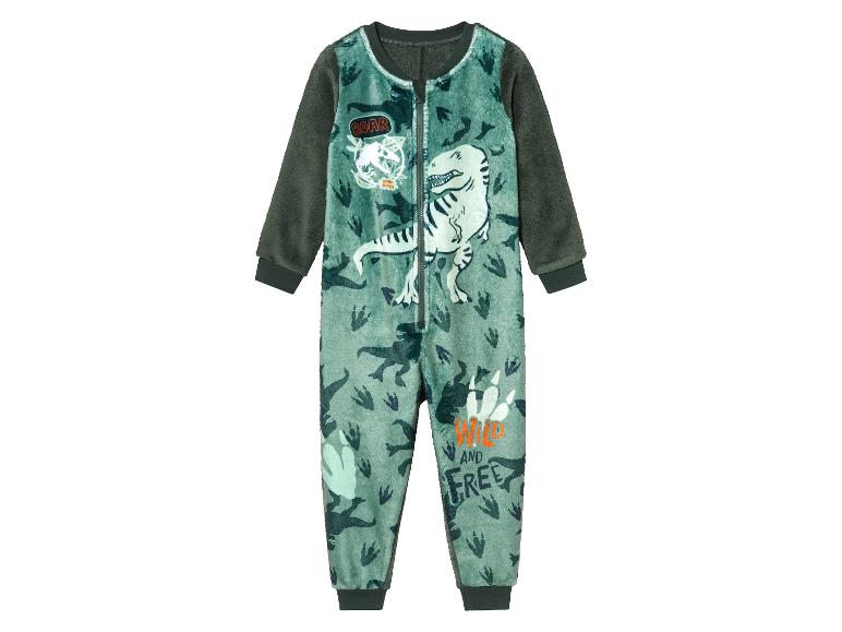 Grüner Kinderpyjama mit Dinosaurier-Motiv.