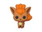 Braune und orangefarbene Pokémon-Vinylfigur mit geringeltem Schwanz.