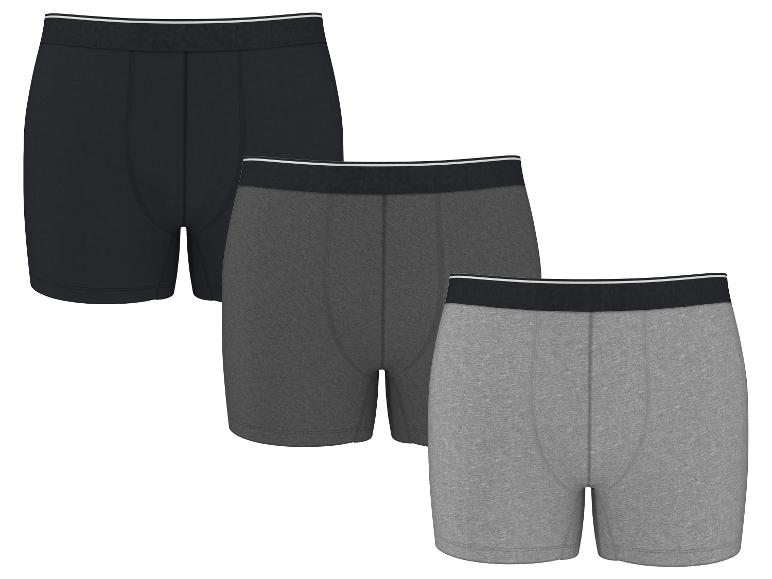 Dreierpack Herren-Boxershorts in Schwarz, Dunkelgrau und Hellgrau.