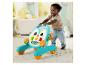 Fisher-Price Lauflernhilfe im Pinguin-Design mit einem Kind, das laufen lernt.