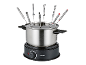 Ein Edelstahl-Fondue-Set mit acht Gabeln und einem schwarzen Sockel mit Temperaturregler.