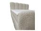 Beiges Boxspringbett mit gepolstertem Kopfteil und weißer Matratze.