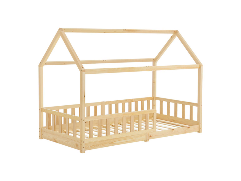 Ein Kinderbett aus Holz mit einem hausförmigen Rahmen