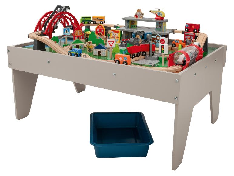 Holzspieltisch mit Eisenbahnset, Stadtlandschaft und Aufbewahrungsbox.