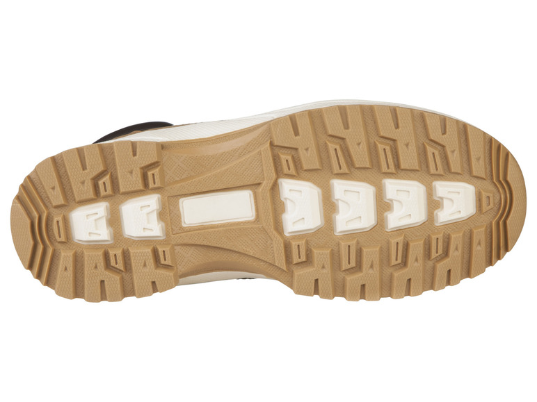 Die Sohle eines braunen Sneakers mit weißem Profil.