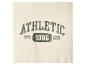 Bestickter Text „ATHLETIC 1986“ auf beigem Hintergrund.