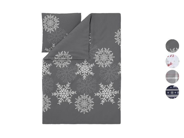 Graues Bettwäsche-Set mit weißen und hellgrauen Schneeflocken.