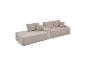 Beiges modulares Cordsofa mit Kissen.