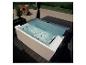 HOME DELUXE Outdoor-Whirlpool Nimbus Deluxe auf einer Holzterrasse.