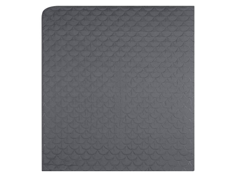 Graue gesteppte Decke mit Schuppenmuster