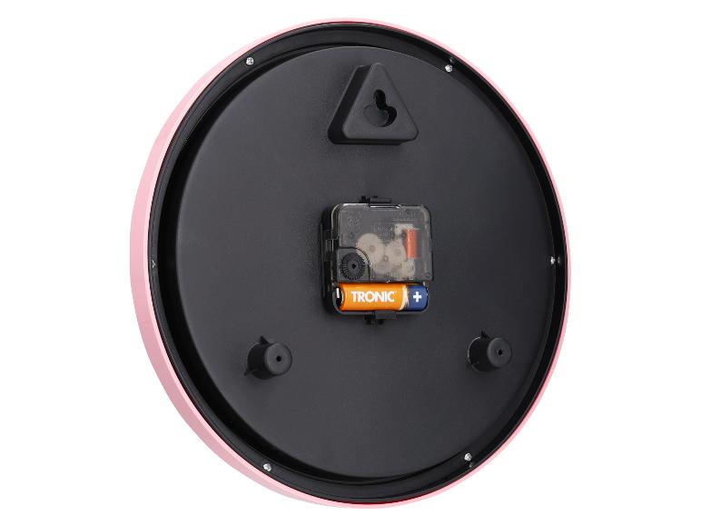 Rosa runde Wanduhr, sichtbares Quarzwerk.