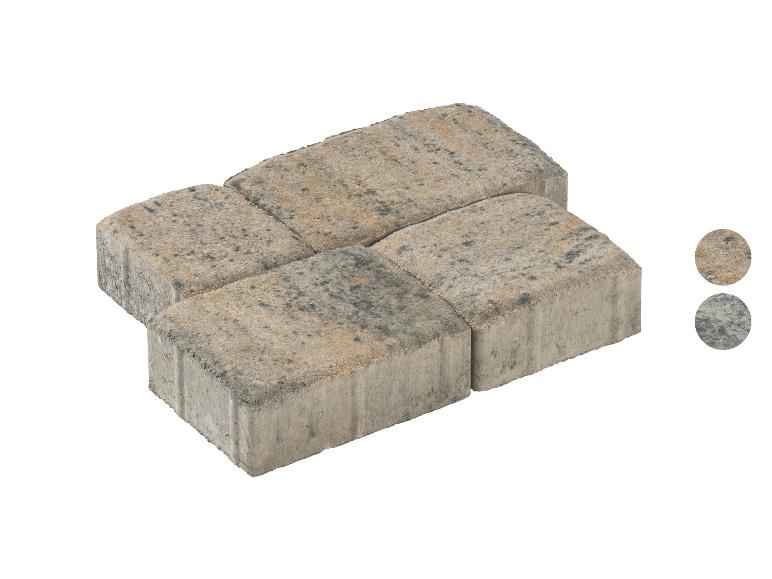 Vier beige und graue Pflastersteine, kreuzförmig angeordnet.