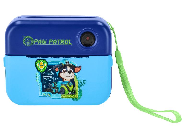 Blaue Digitalkamera mit grünem Riemen und einer Zeichentrickfigur