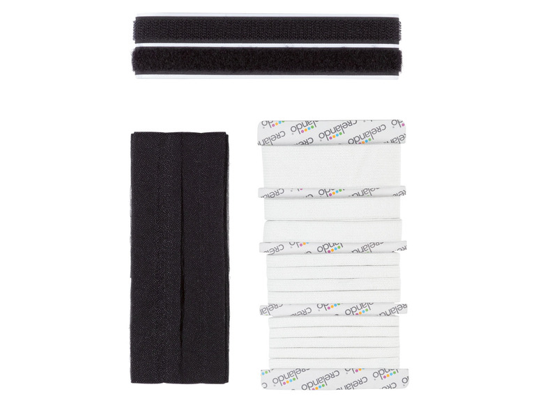Schwarze Klettbänder und weißes selbstklebendes Klebeband der Marke Crelando.