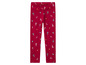 Rote Leggings mit Weihnachtsbaum-Muster.