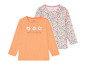Zwei Lupilu Langarmshirts für Mädchen, eines mit Blumenmuster und eines mit drei Blumen und dem Text 'such a lovely day'.
