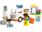 Krankenwagen-Spielset mit Figuren, Ampel und medizinischem Zubehör.