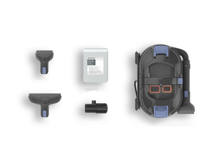 SilverCrest Staubsauger mit Zubehör und Reinigungsmittel.