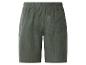 Dunkelgrüne Baumwollshorts mit elastischem Bund und Gesäßtasche.