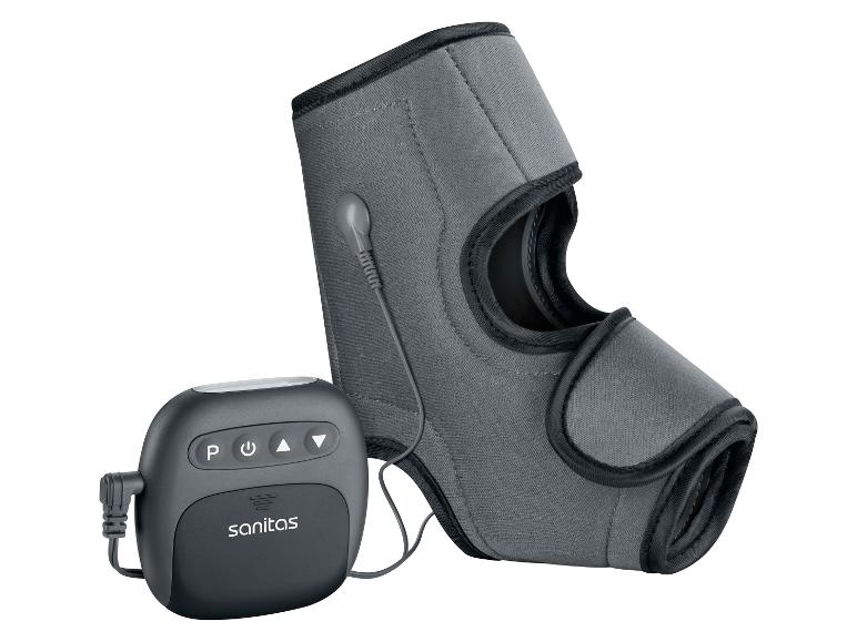 Eine graue Ellbogenstütze mit angeschlossener Steuereinheit zur Elektrostimulation.