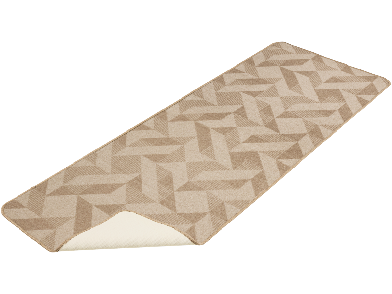 Beiger Läufer mit geometrischem Muster, teilweise aufgerollt, um die Rückseite zu zeigen.