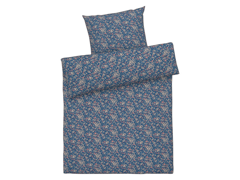 Bettbezug und Kissenbezug mit Blumenmuster.