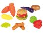 Ein Spielzeug-Hamburger, Würstchen, Karotten und anderes Spielzeug-Gemüse.