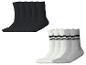 Schwarze und gestreifte weiße und graue Socken