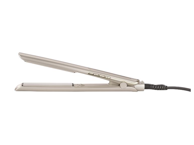 Ein beiges Glätteisen mit Bedientasten und einem schwarzen Kabel.