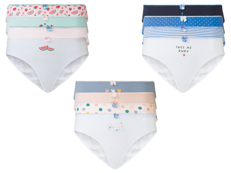 Drei Sets Mädchenunterwäsche mit verschiedenen Prints, darunter Wassermelone, Punkte und blaue Streifen.